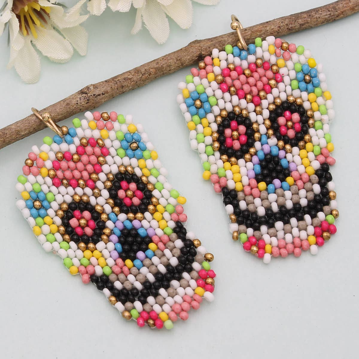 floral pastel skull earrings