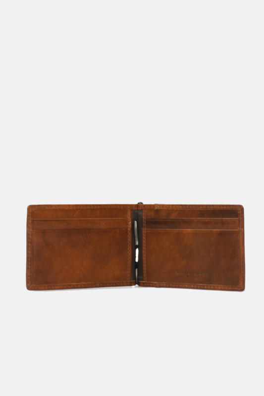 open brown wallet against a white background