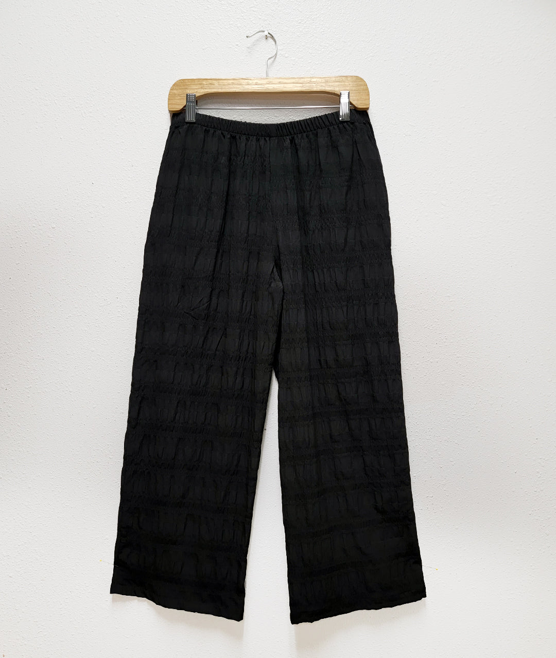 black wide leg pant with a soft striped pattern