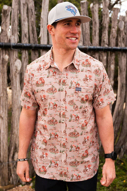 male model wearing a khaki colored shirt with western print