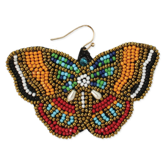 Warm amber, red, turquoise and blue beads are embroidered on a butterfly shape fabric earring hanging from gold ear wire. 