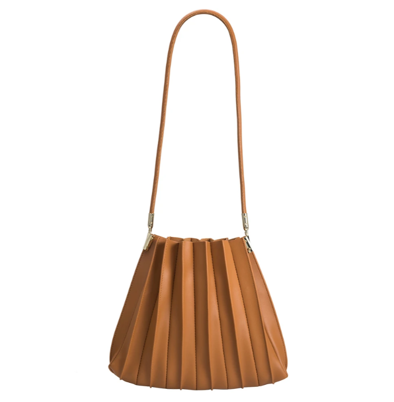 tan handbag with a long strap and a pleated detail