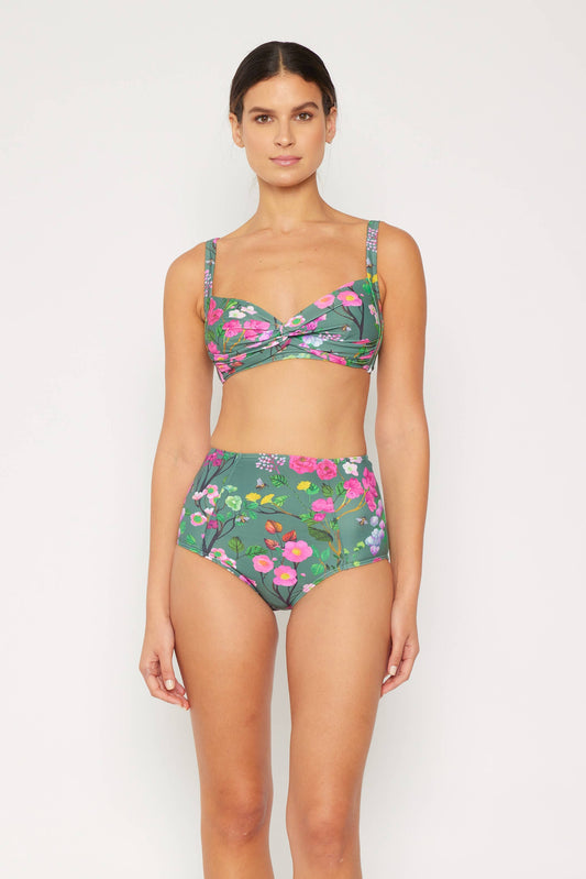 model is wearing a green floral high waisted bikini