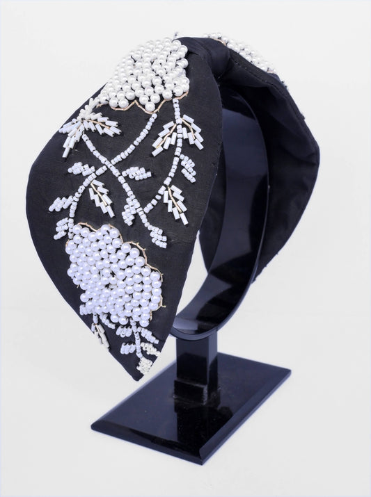black headband with pearl embellishing