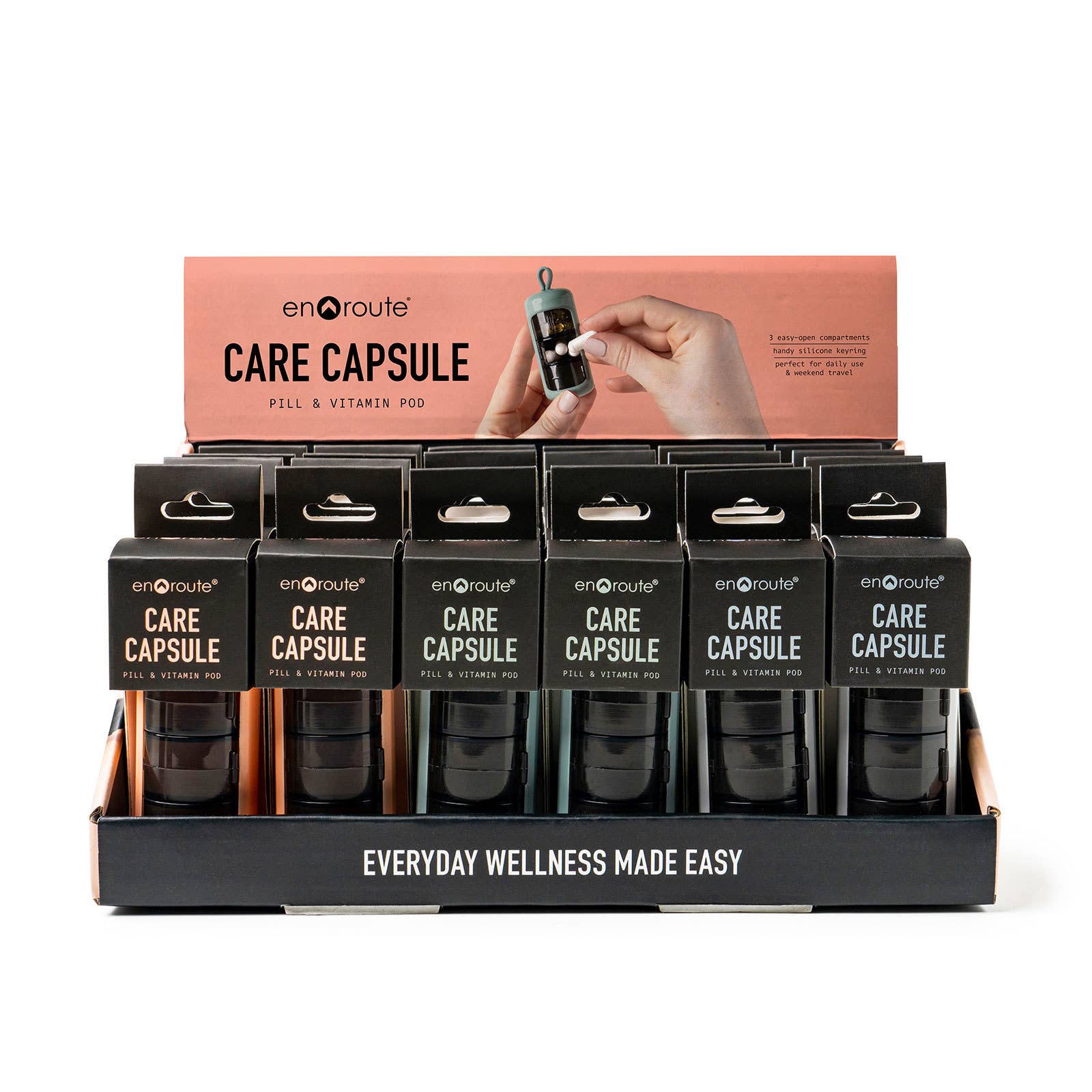 box of multicolored vitamin pods labeled "care capsule"