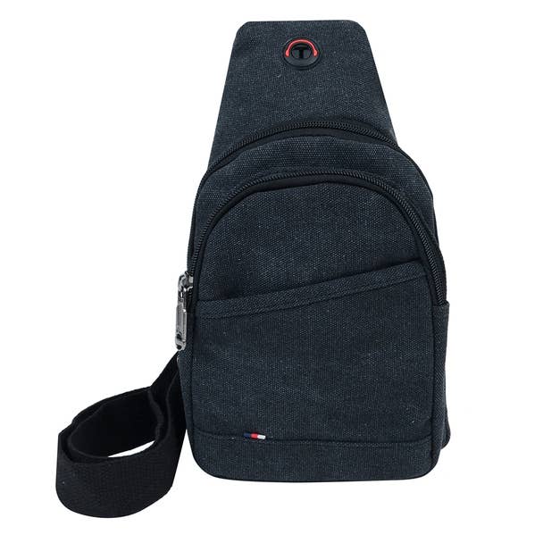 the image shows a black canvas crossbody bag against a white backdrop