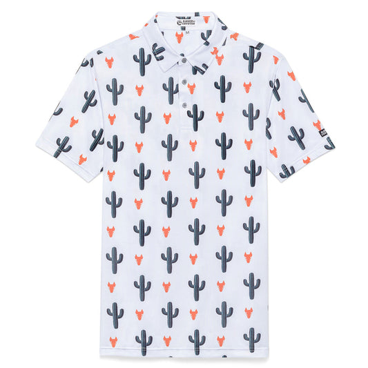 white polo with cacti and coyote head graphics against a white background