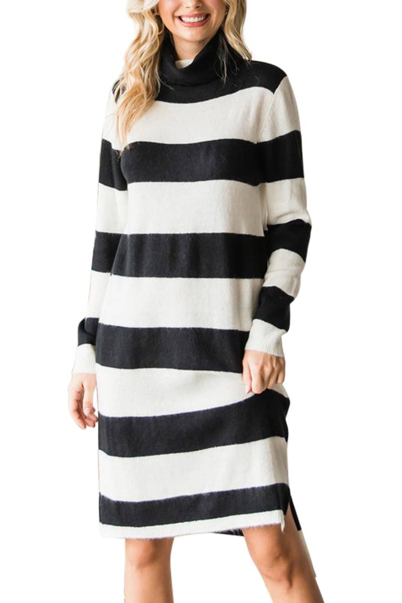 model is wearing a black & white striped sweater dress against a white background
