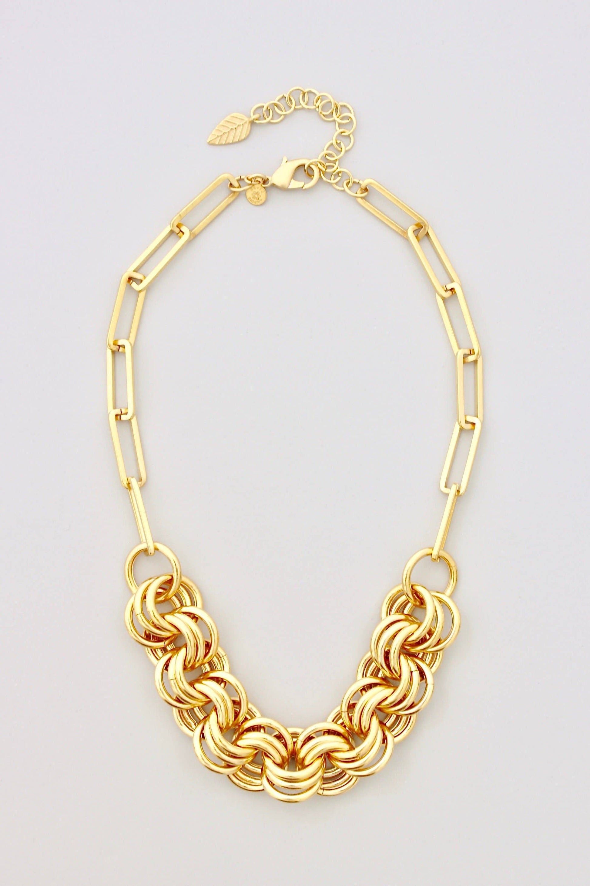 18” 18k gold plated brass chain necklace with 3 inch extender against a light grey background