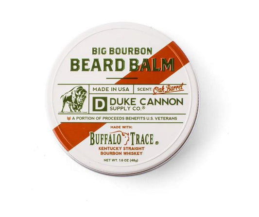 Pictured against a white background is a circular white tin for beard balm