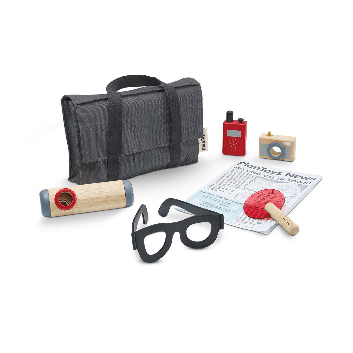 kids detective play set featuring a black briefcase, newspaper, red walkie talkie, wooden camera, black glasses, and a red magnifying glass.