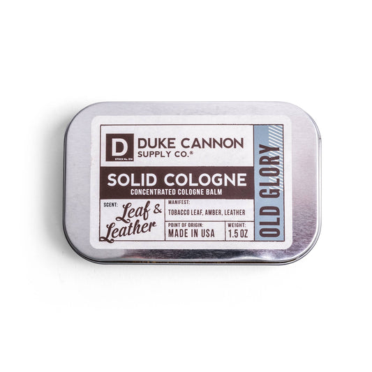 duke cannon cologne balm in tin packaging