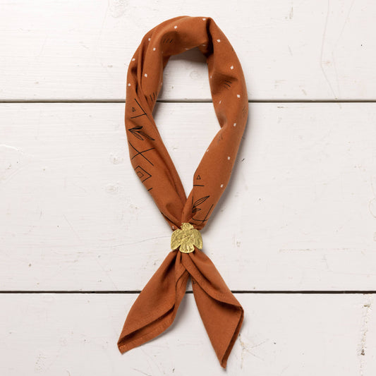 orange bandana with brass thunderbird bandana slide