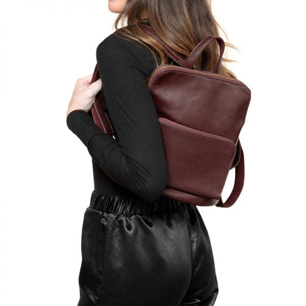 model with a wine color backpack