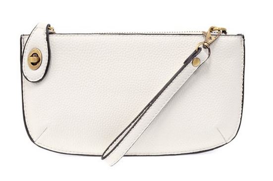 Pictured is a small white crossbody clutch
